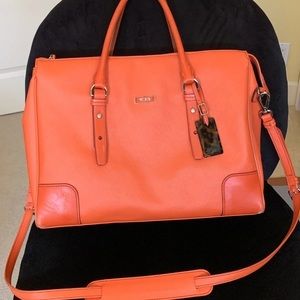 Tumi Orange Leather Carrier